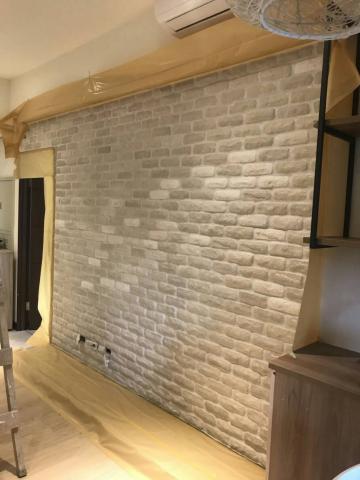 林榮文 - 設計師場電視牆防水施作、貼文化石、擦亮光漆