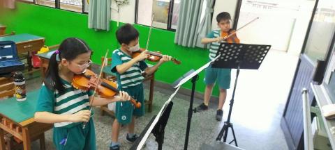 Kuan Ju 音樂藝術工作室 - 淡水區淡水國小弦樂課後社團中提琴分部