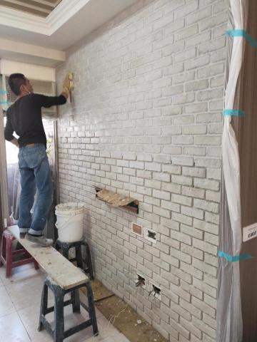 逹雅室内設計裝修工程公司 - 客厅電視牆面貼文化石