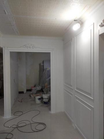 紀凱騰 - 主牆上漆前多道批土研磨