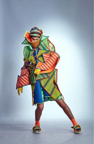 王柏堯 - 畢業展作品

主題:Project.D

D代表dream也代表我的名字Daniel
服裝設計系的學生們都是車手，踩下車機油門為自己的未來奮鬥，運用賽車片片組裝的方式運用在作品上，讓結構變得有趣，可無限堆疊延伸表示學生可不斷茁壯，用亮色代表積極不放棄的精神。

