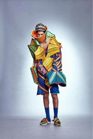 王柏堯 - 畢業展作品

主題:Project.D

D代表dream也代表我的名字Daniel
服裝設計系的學生們都是車手，踩下車機油門為自己的未來奮鬥，運用賽車片片組裝的方式運用在作品上，讓結構變得有趣，可無限堆疊延伸表示學生可不斷茁壯，用亮色代表積極不放棄的精神。

