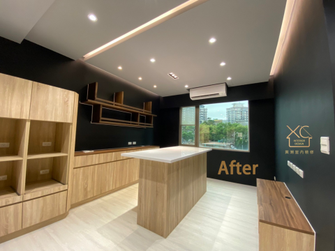 興潮室內裝修有限公司 - 以深色的牆面，帶出高雅的質感，呼應生活美學，
以中島取代常態的沙發及茶几，希望帶出渡假的氛圍