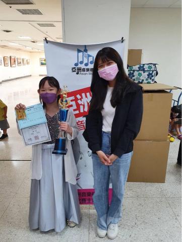 劉羿漩 - 亞洲盃鋼琴演奏比賽中年級組第一名