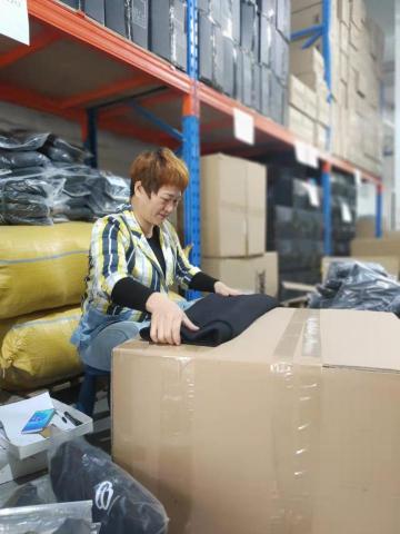 愛買供應鏈有限公司 - 大陸廣州倉庫專業品檢衣服鞋子包包等回台貨品