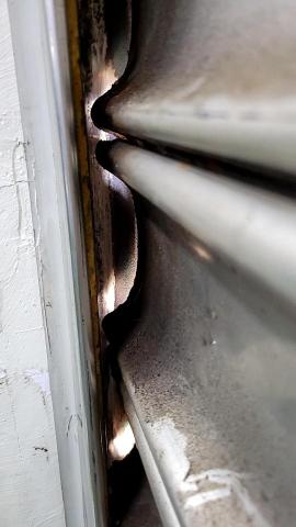 郡祥   居家修繕工作室 - 鐵捲門片變形修復