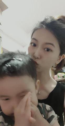 戴婉伃 - 幫媽媽帶小孩的照片