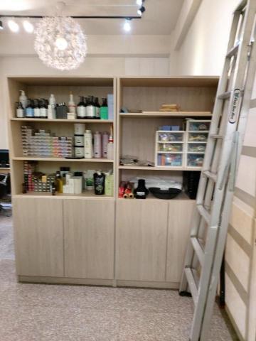 黃嘉文 - 髮廊用品收納櫃，因店面是租的，所以櫃體做成活動式，退租可以帶走。
