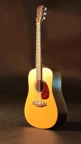 王呈功 - 模型設計：民謠吉他。本作品全由木板材料從無至有雕琢、研磨、拼接、塗裝完成，採樣自我個人的美國 Martin D-1R 民謠吉他造型100%還原製作而成。