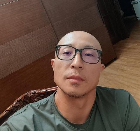 提供冷氣機服務的專家黃慶騰