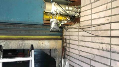 一一乙電動鐵捲門維修 - 檢修東元捲門機