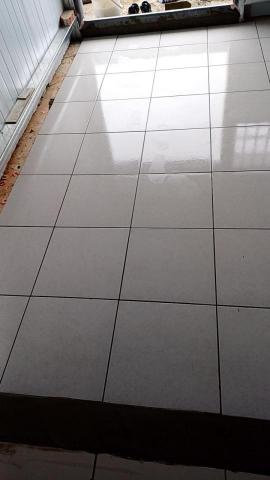 劉邦立 - 屋頂加蓋鐵皮屋採用40_40石英磚