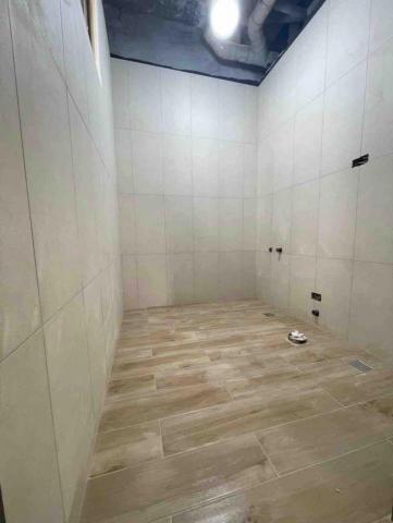 乾澤工程行 - 浴室翻修壁30*60地木紋磚