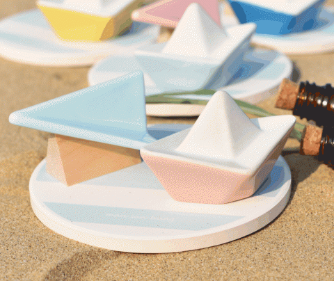 Avo Li - I drew inspiration from childhood memories, crafting delicate aroma diffused ceramics adorned with origami airplanes and paper boats. It envelops us in comfort and with its permeating scent.