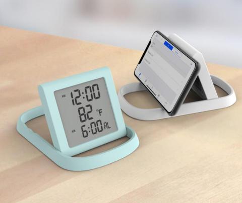 Avo Li - This is an interesting European gift design project. It’s a simple little alarm clock, also a phone holder, and can be taken to the kitchen to be hung up, turning into a kitchen timer.