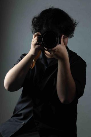 提供沙龍照情侶服務的專家黃冠宇