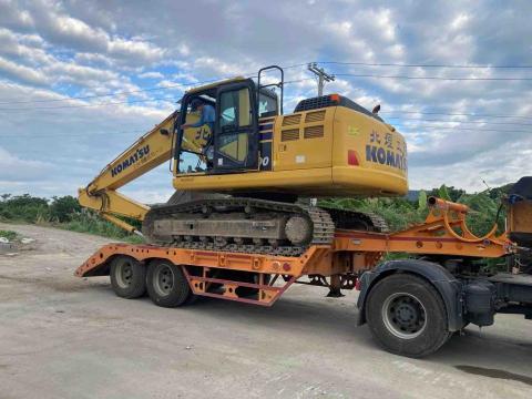 倫心實業有限公司 - 挖掘機運送