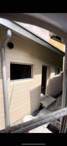 TX工程行 - 外牆二丁掛 米黃色填縫完工