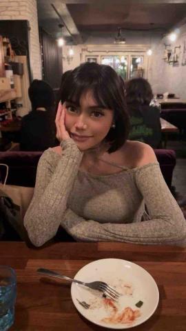 提供公關服務的專家Rola  Wang