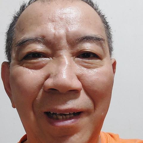 提供送機專車服務的專家翁振榮