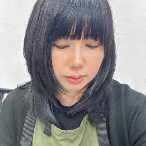 提供髮型服務的專家Yumi Tung