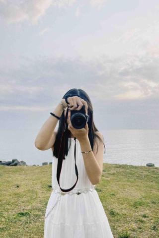 提供拍照相服務的專家Liu Ling