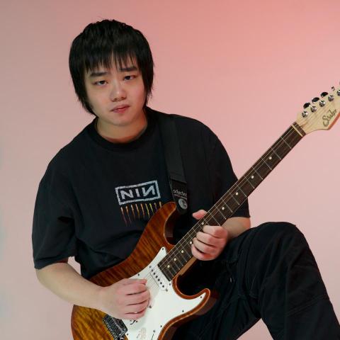 提供吉他表演服務的專家林哲宇