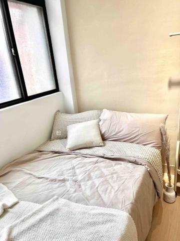 優好室資產管理｜包租代管｜北北基桃 - 格紋奶茶採光臥室