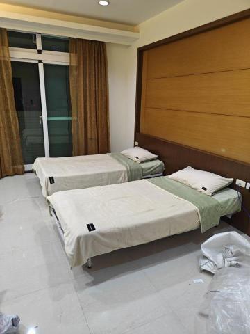 柯力元 - 設計和挑選床組，包含床架，床墊，床單枕頭等，作為民宿用。