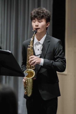 趙祈叡 - 在開森薩克斯風種子團，擔任獨奏
