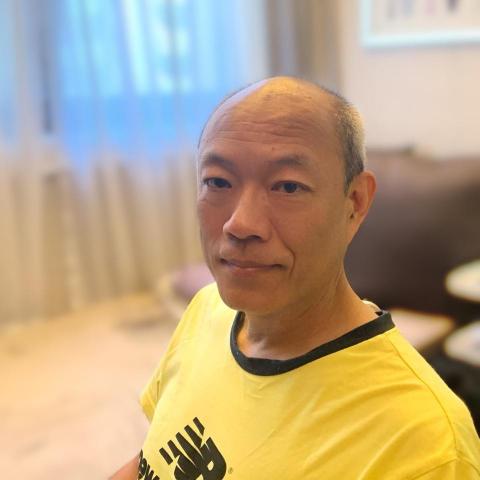 提供遛狗繫狗鍊服務的專家平國偉