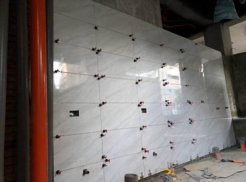 承藝室內裝修 - 公共工程翻修廁所牆面貼30*60釉面磚