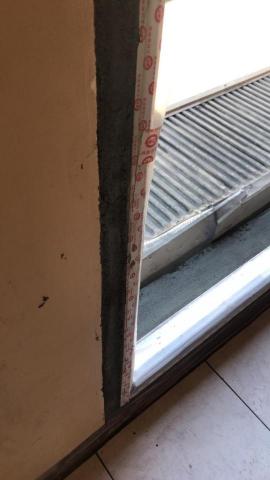 泉鋒工程行/黃鏵鋕 - 窗框填縫，打石補平抹平