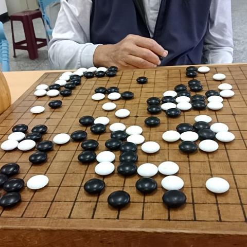 提供圍棋服務的專家蔡國平