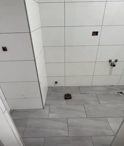 陳泰源 - 廁所地板防水與磁磚換新