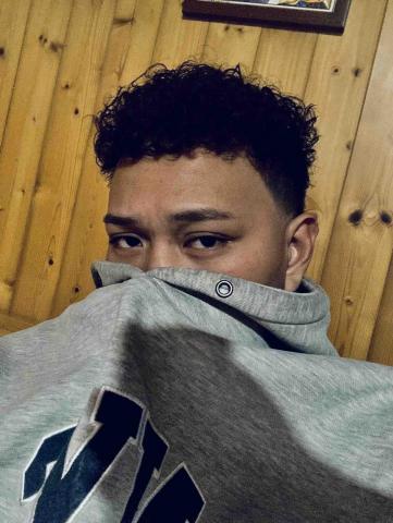 提供髮型師學徒服務的專家邱誠安