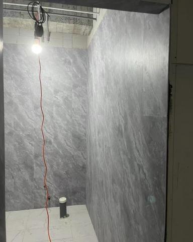 洺崴有限公司 - 嘉義市垂楊路飯店衛浴翻新/大理石紋路SPC牆板