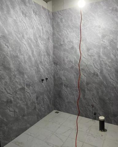 洺崴有限公司 - 嘉義市垂楊路飯店衛浴翻新/大理石紋路SPC牆板