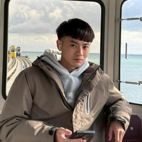 提供2022世足地點服務的專家陳飛揚