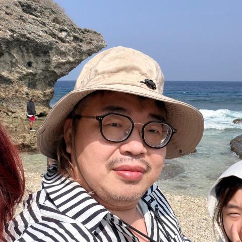 提供剪髮剪刀服務的專家Michael  昭霖