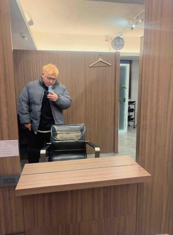 提供行動理髮服務的專家楊先生