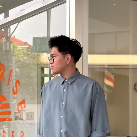 提供理髮服務的專家潘名軒