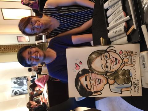 米豆人像漫畫現場 - 又快又像的獨一無二禮物,貴賓快樂的神情表露無遺。