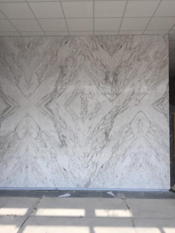 穩美國際有限公司/陳智榮 - 義大利大理石電腦切割呈現藝術性對稱紋路