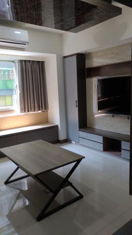 樸森室內裝修工程行 - 位於永和連勝街的案子，客廳用了臥塌與仿石材天花與電視牆